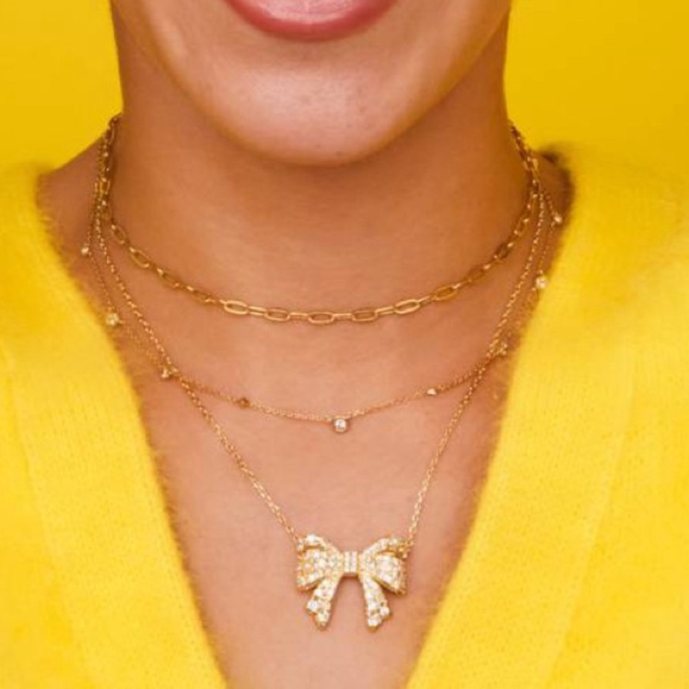 Kendra Scott Krista Gold Bow Short Pendant Necklace in White Mix - Picture 3 of 8